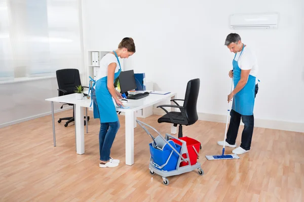 depositphotos_91702966-stock-photo-cleaners-with-cleaning-equipments